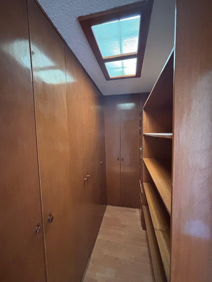 21 de 37: Vestidor recámara principal