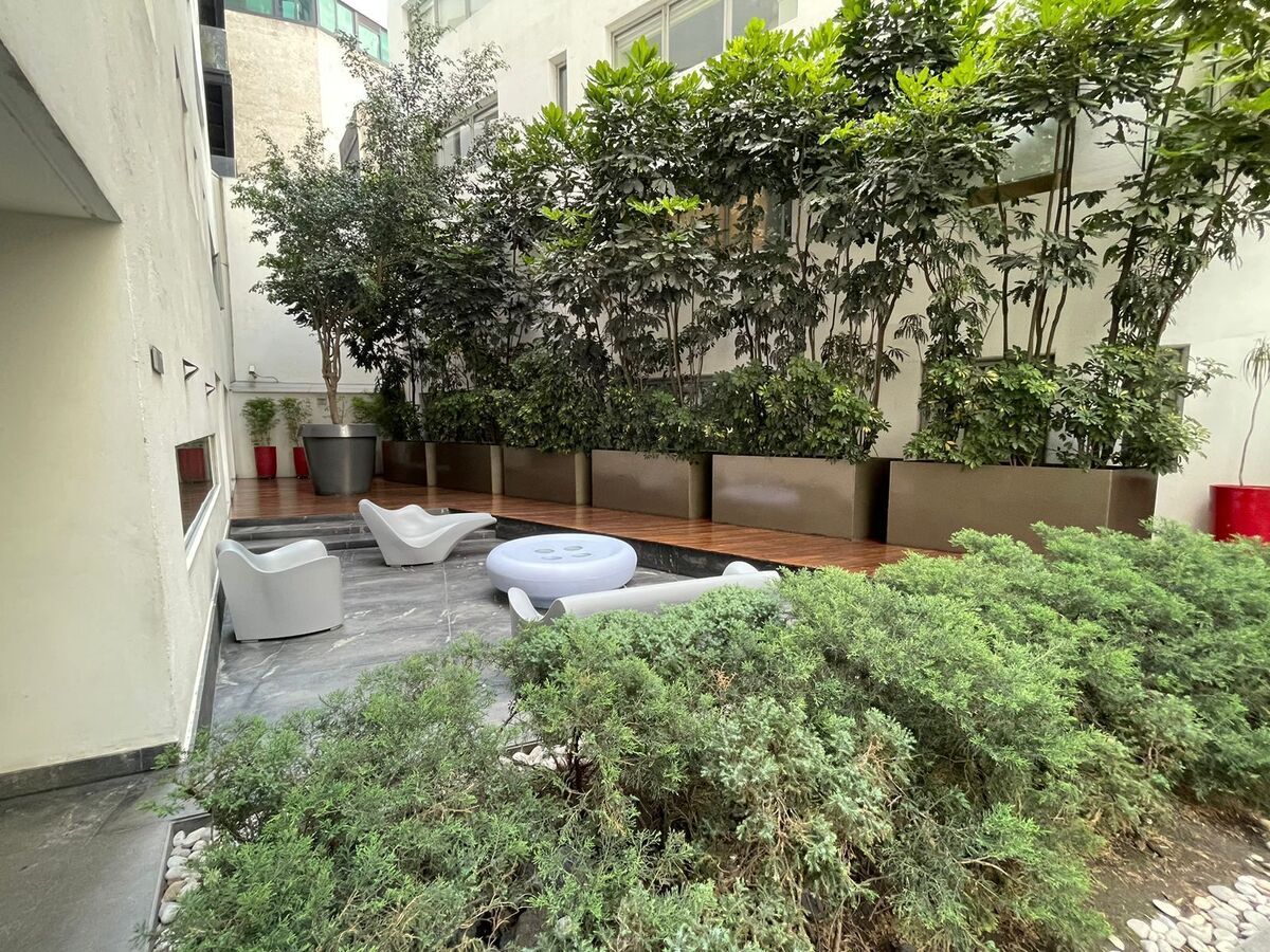 16 of 27: Espacios abiertos con area infantil