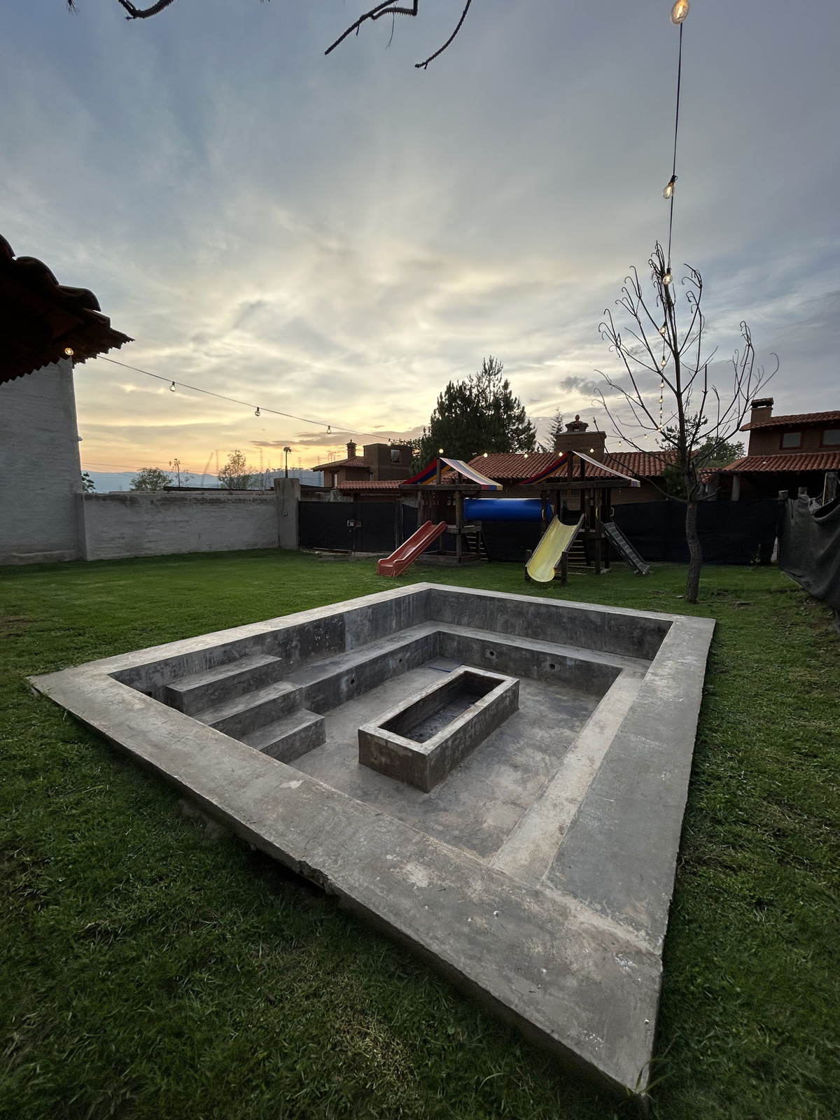 1 of 18: Firepit and playground