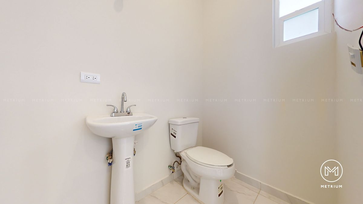 5 de 14: Medio Baño