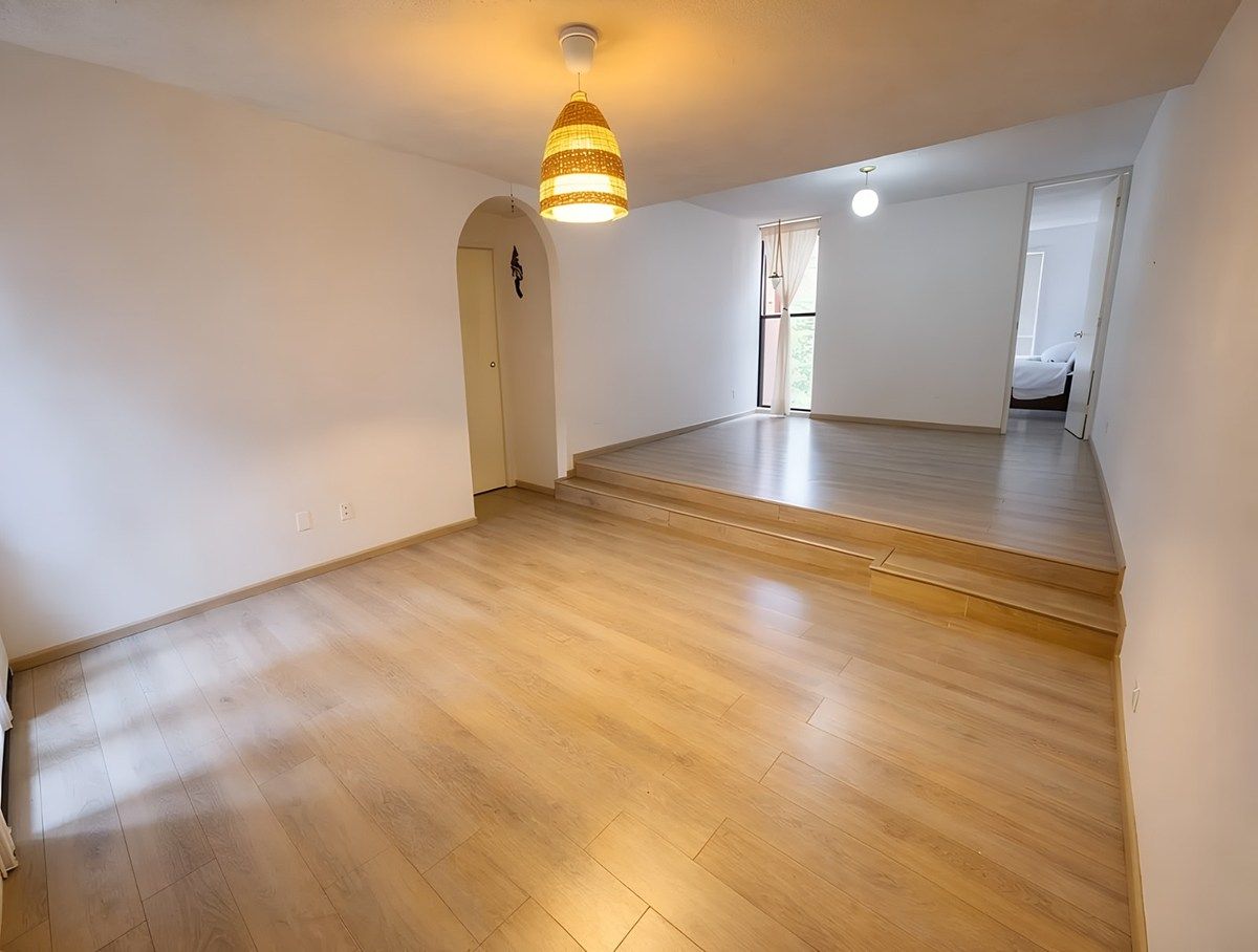 Visualización de los espacios de sala y comedor sin muebles., foto 30 de 30