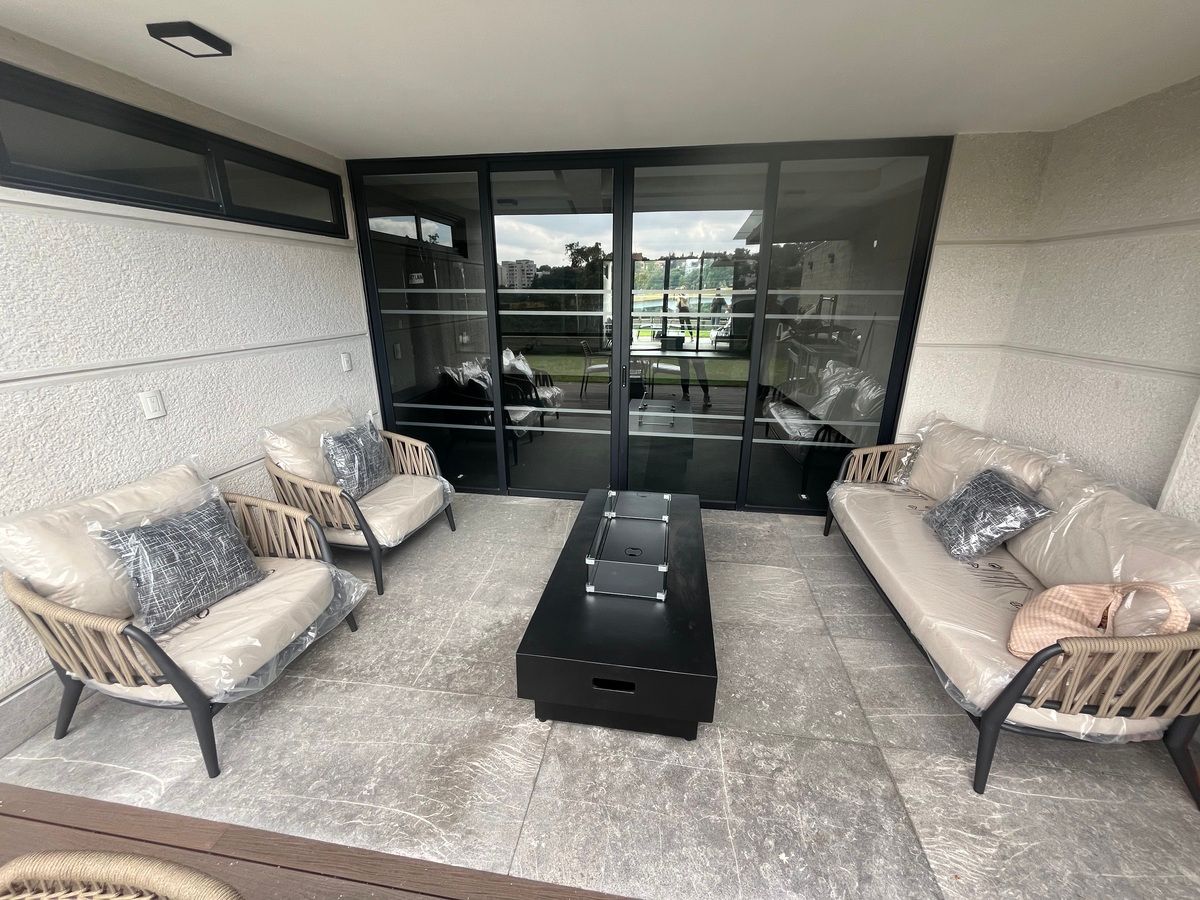 15 de 27: Area común-terraza con chimenea