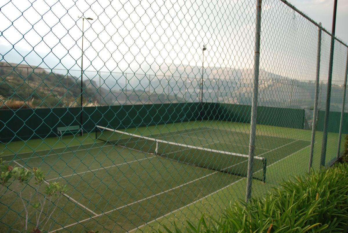 31 de 35: Cancha de Tennis