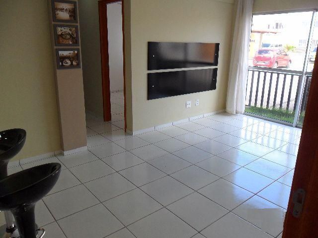 3 de 15: Sala vista para a varanda e corredor acesso aos quartos
