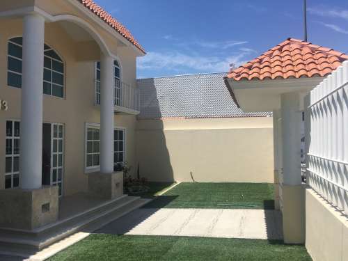 2 de 19: Frente patio