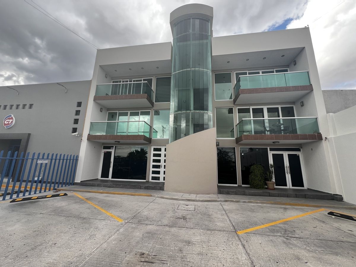 1 de 17: Frente edificio.
