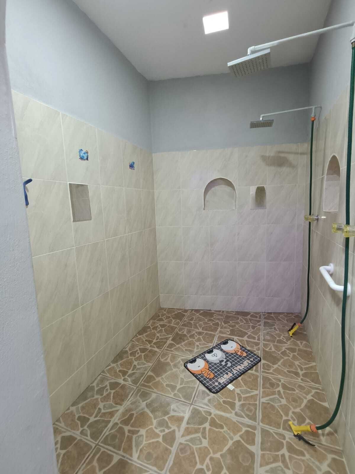 24 de 35: Ducha con dos regaderas de recamara principal
