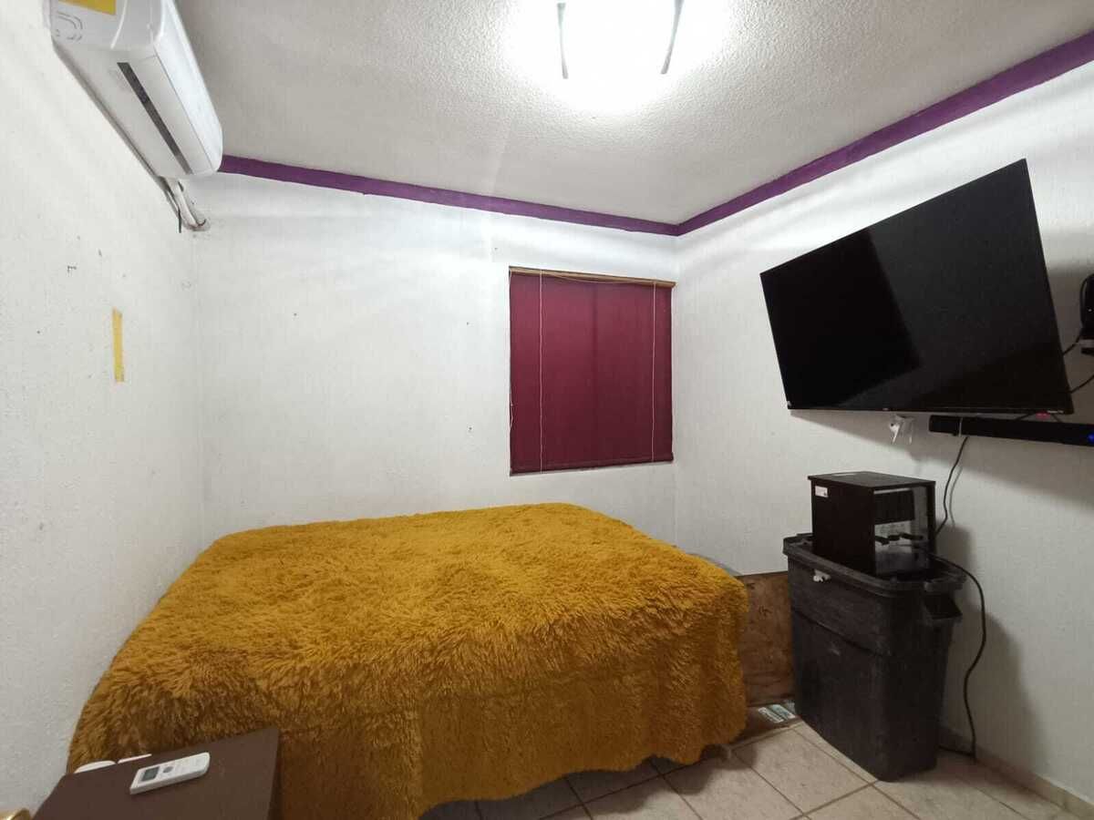 14 de 35: Recámara con aire acondicionado