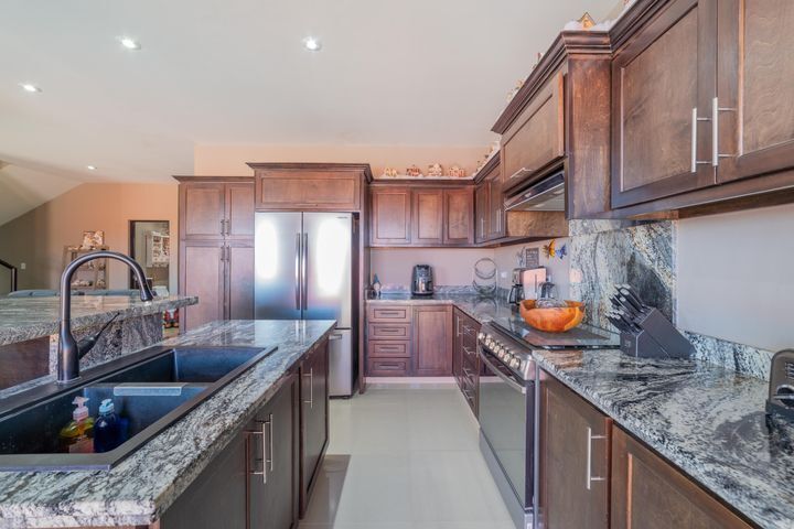 5 of 35: Granite counter-tops and high end appliances