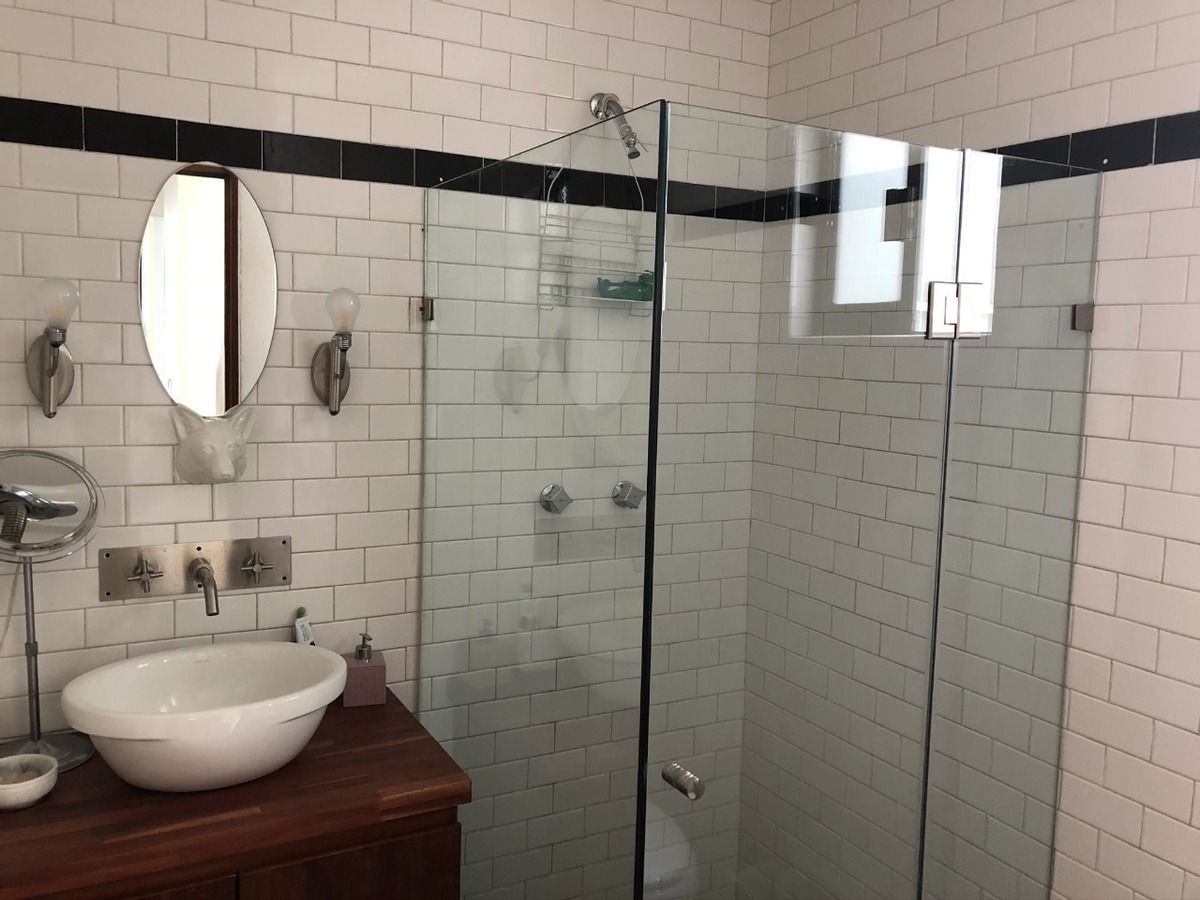 4 de 14: Baño compartido