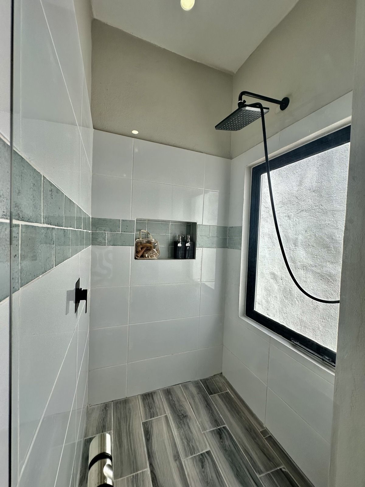 20 de 28: Ducha con puertas de cristal