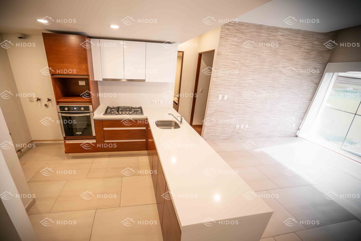 4 de 39: sala comedor con barra y cocina integral
