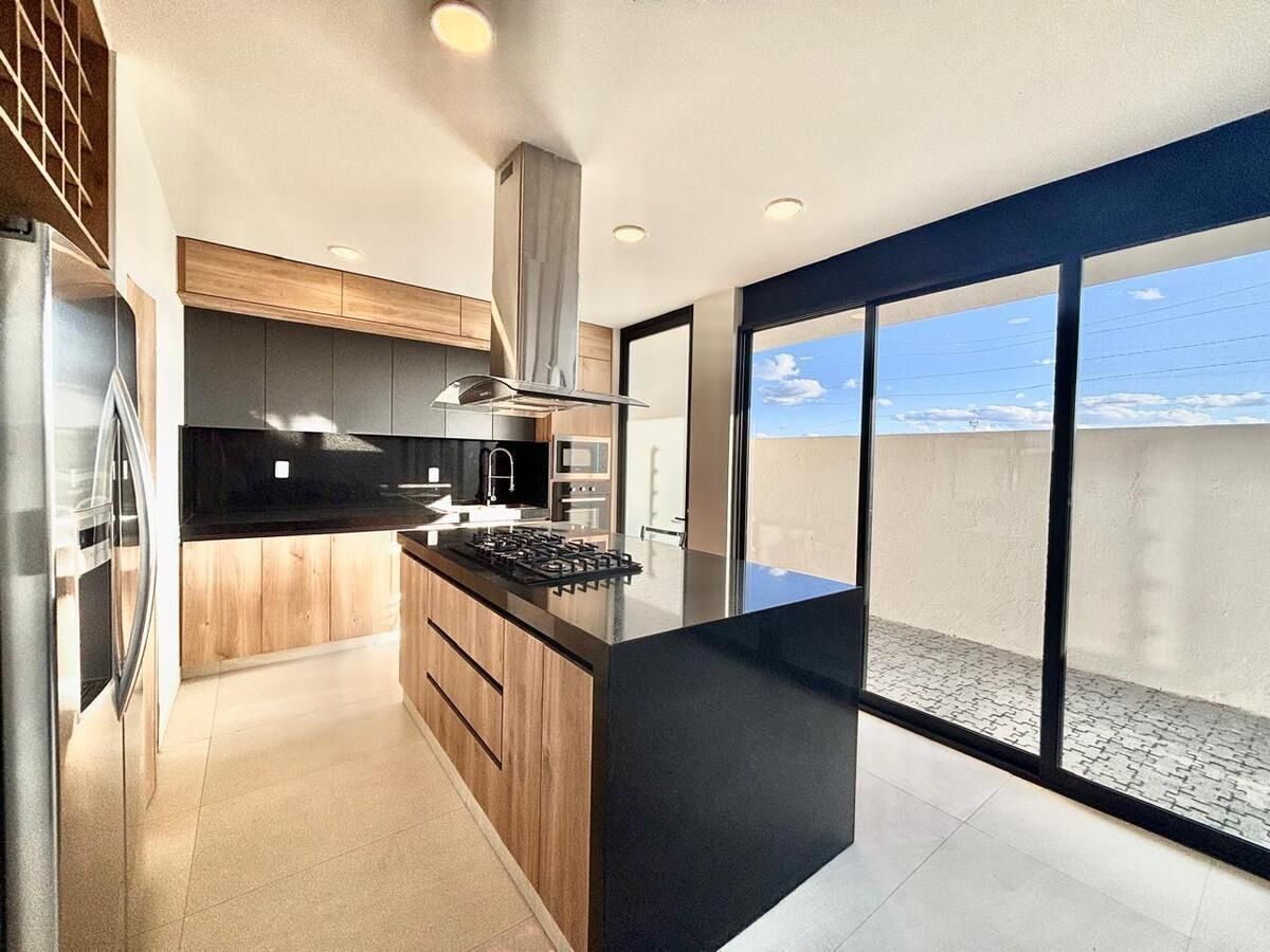 1 de 40: Cocina en granito con isla al centro