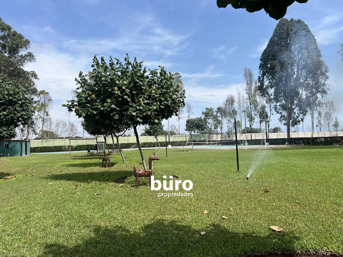 14 de 25: Cancha de Tenis, área común
