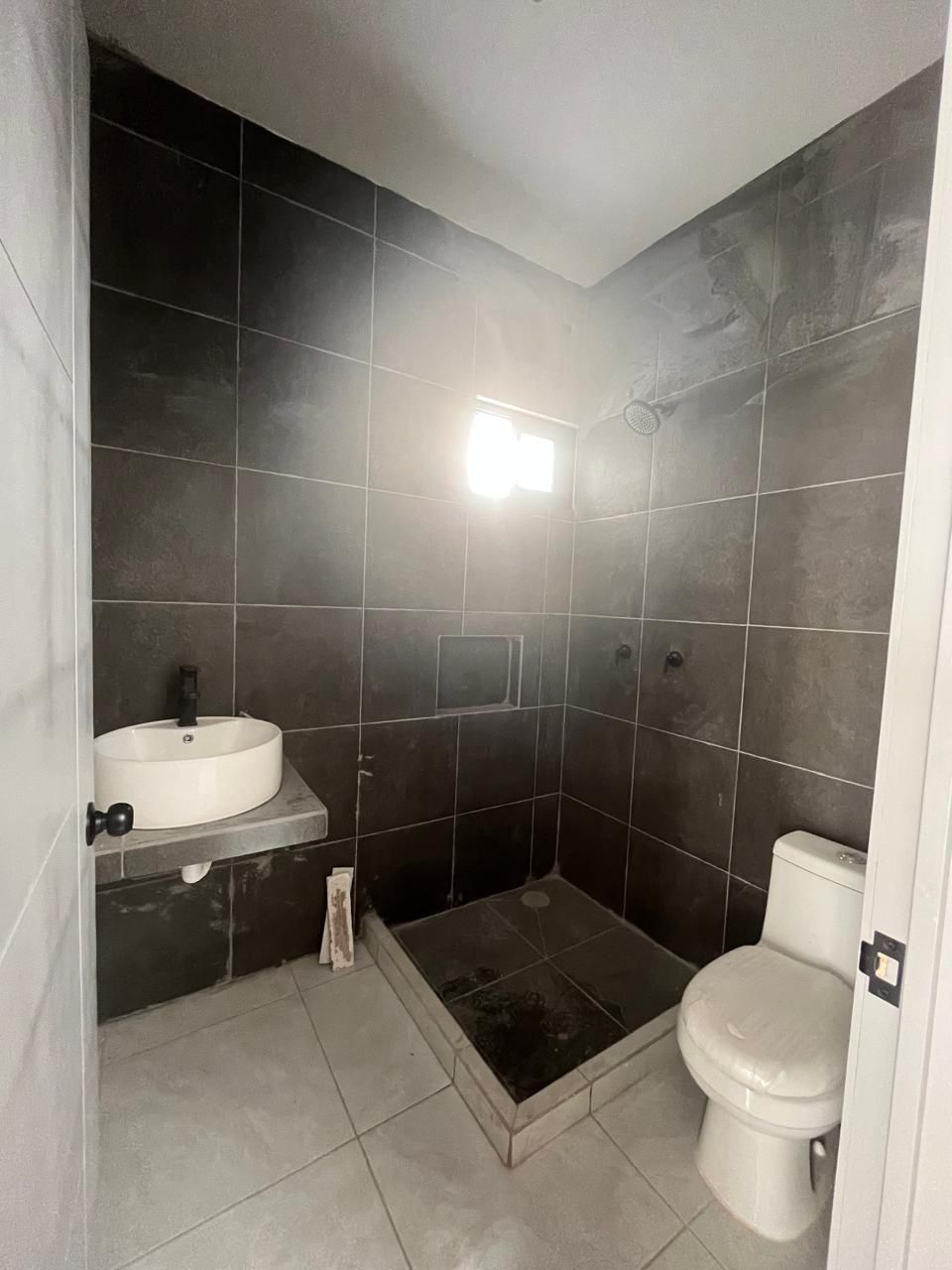 7 de 15: Baño completo en planta baja