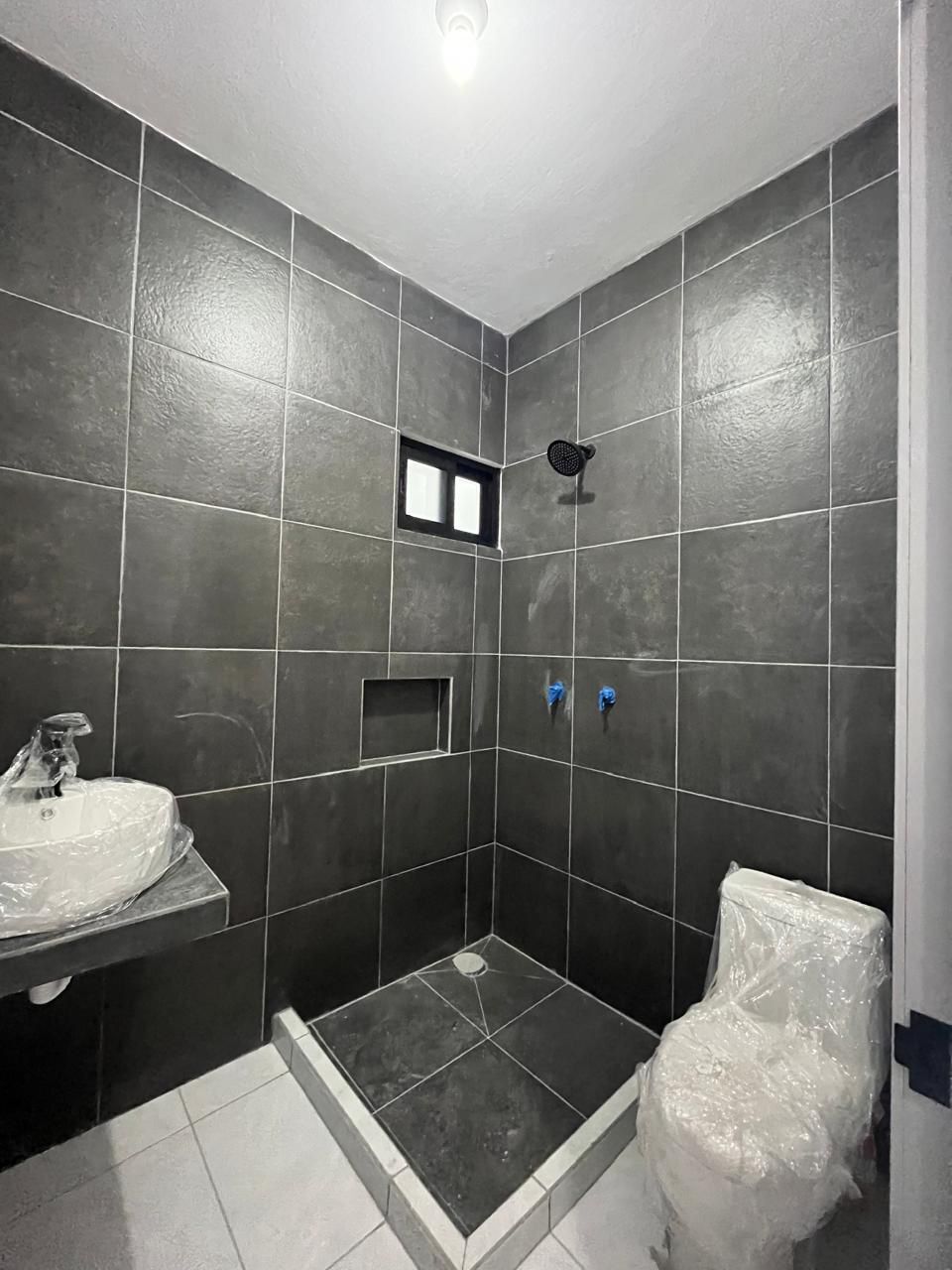 4 de 24: Baño completo en planta baja
