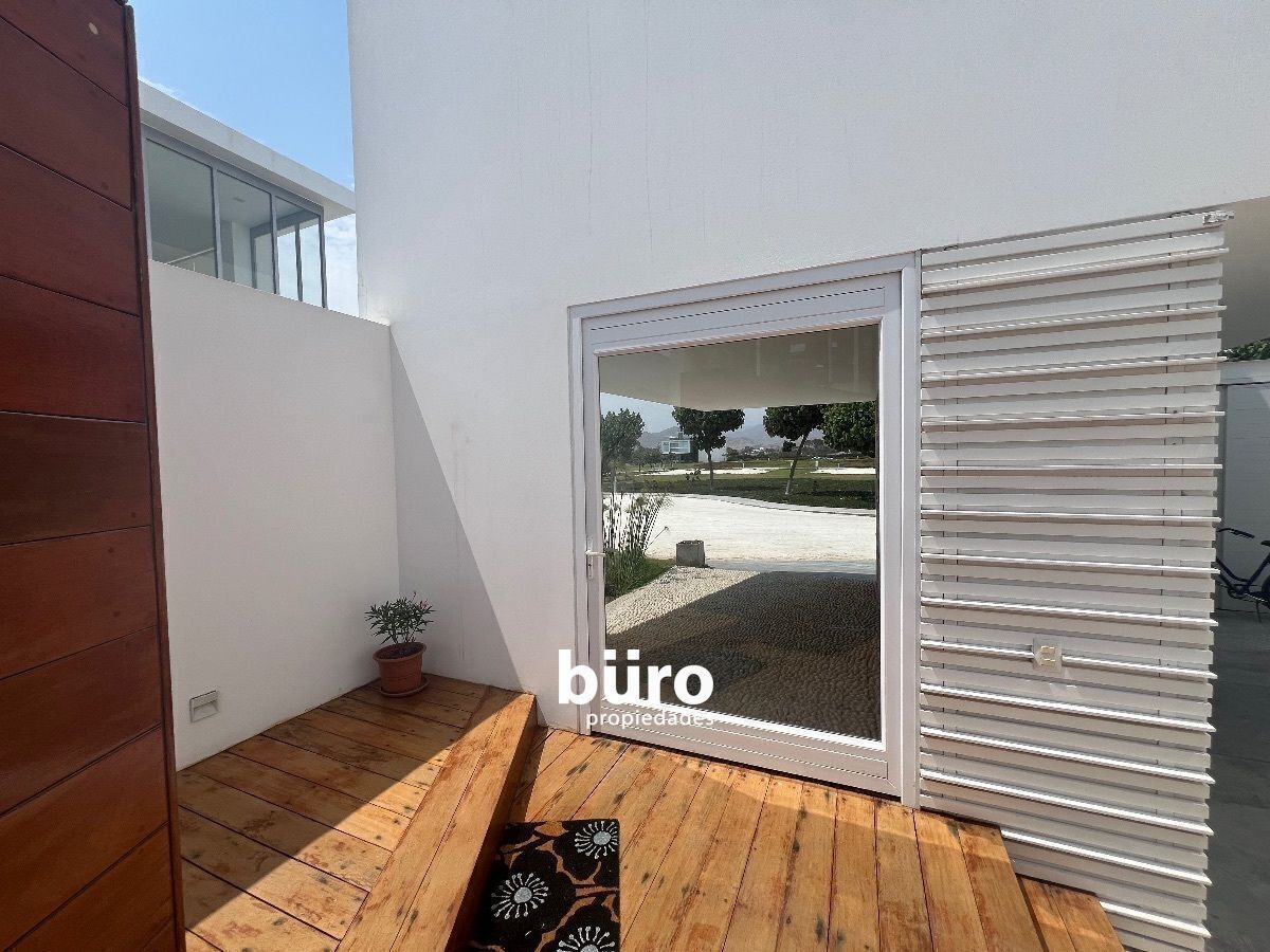 18 de 26: Entrada a la casa