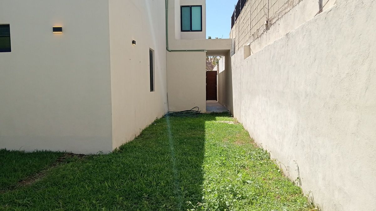 13 de 14: Acceso al jardín