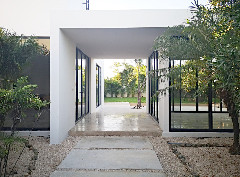 7 de 46: VESTÍBULO DE ENTRADA A LOS DOS MÓDULOS DE LA CASA