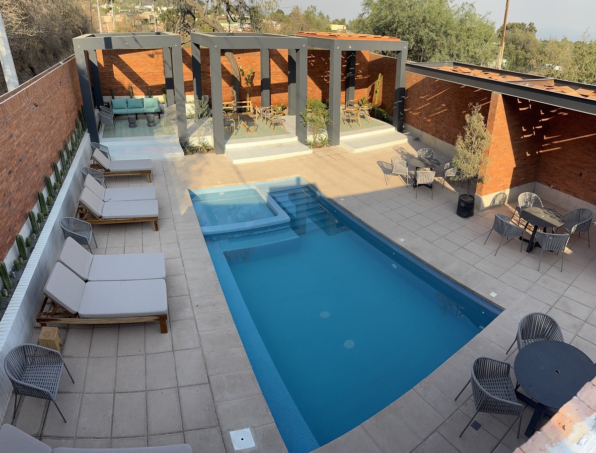 8 of 36: Casa club equipada con alberca