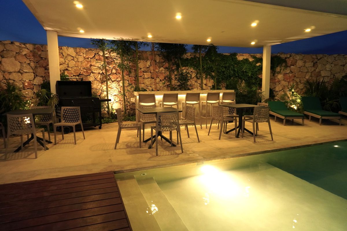 49 de 50: Casa club