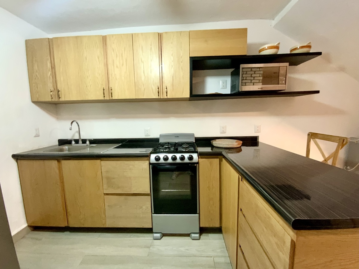 7 of 29: Cocina con espacio de alacena