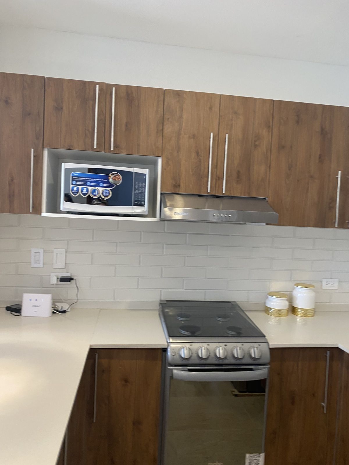 5 de 20: Cocina con microondas y campana