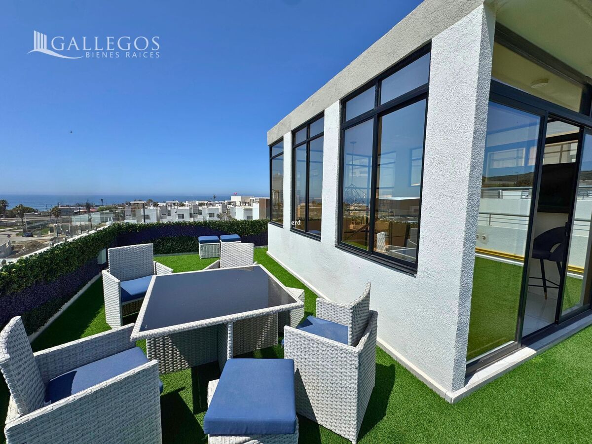 Terraza con vista al mar