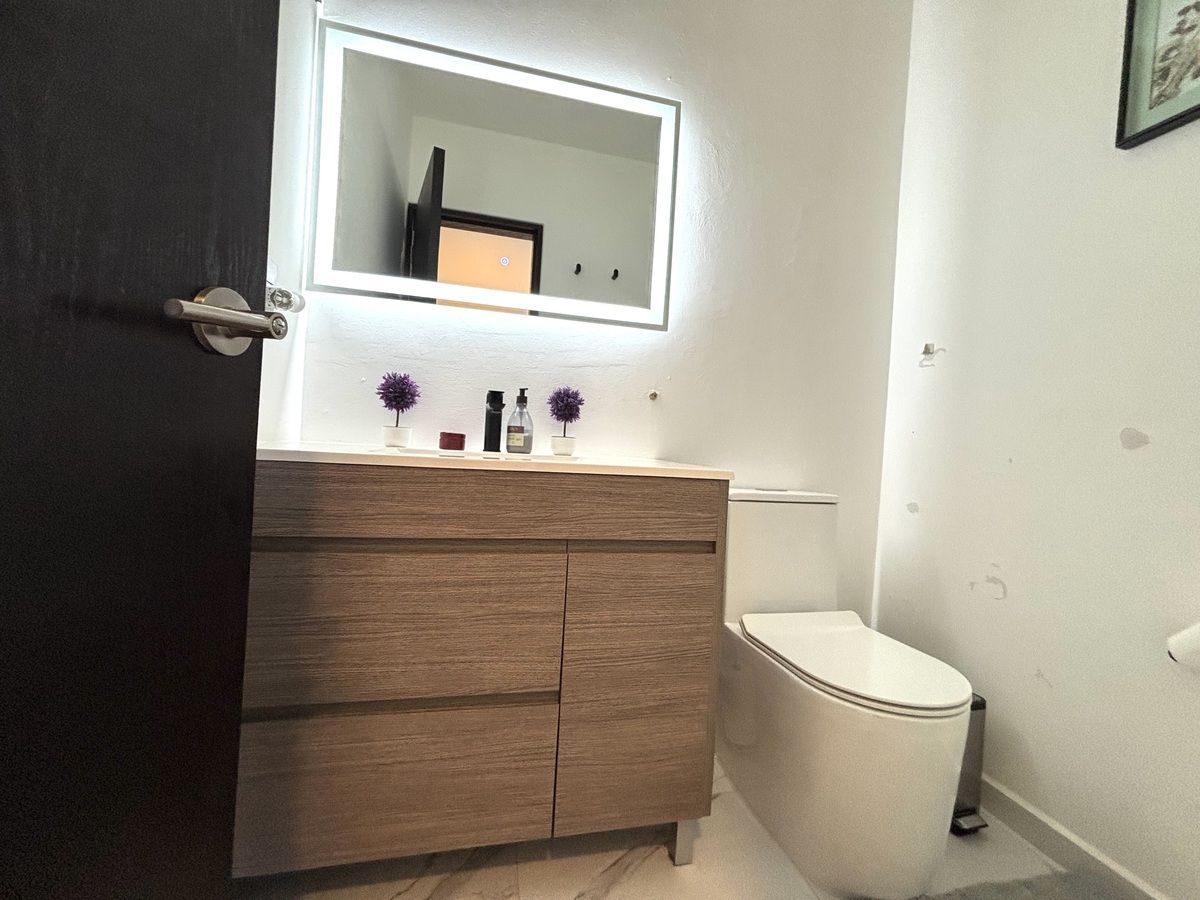 24 de 35: Medio baño para visitas