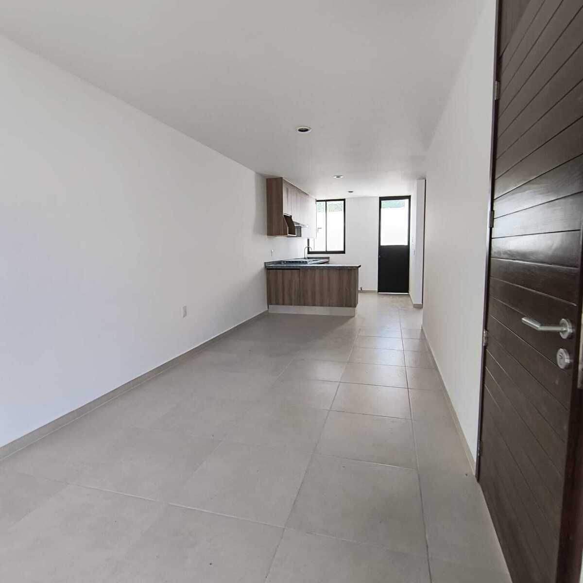 5 de 16: Espacio de sala-comedor y cocina