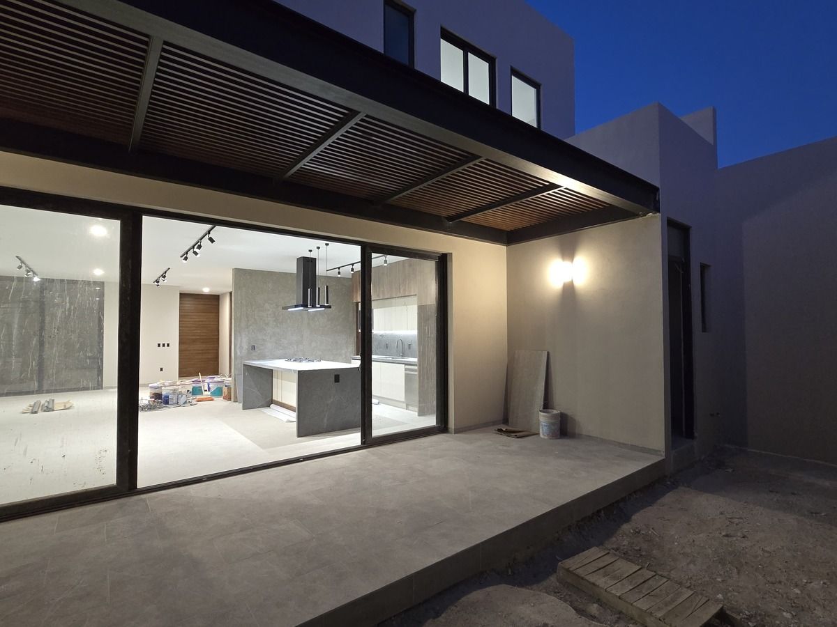 3 de 16: Terraza con vista a estancia y cocina