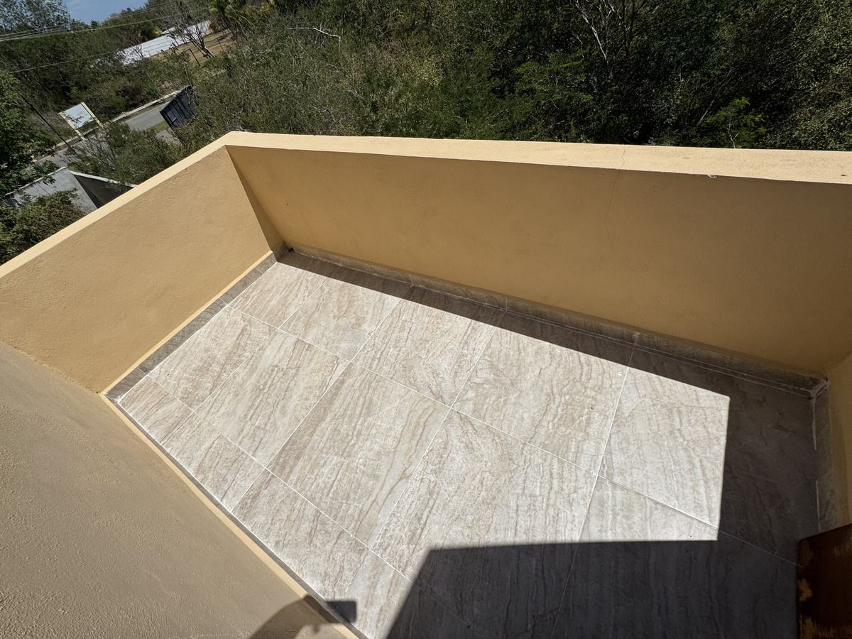 2 de 25: Balcon en la parte trasera