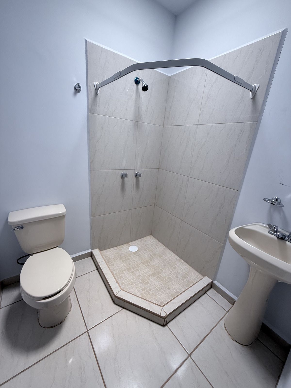 18 de 19: Baño compartido