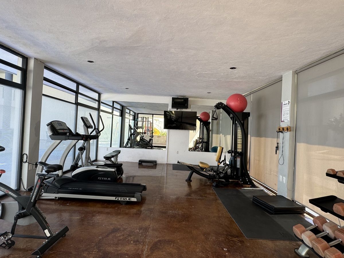 30 de 33: Gym área común