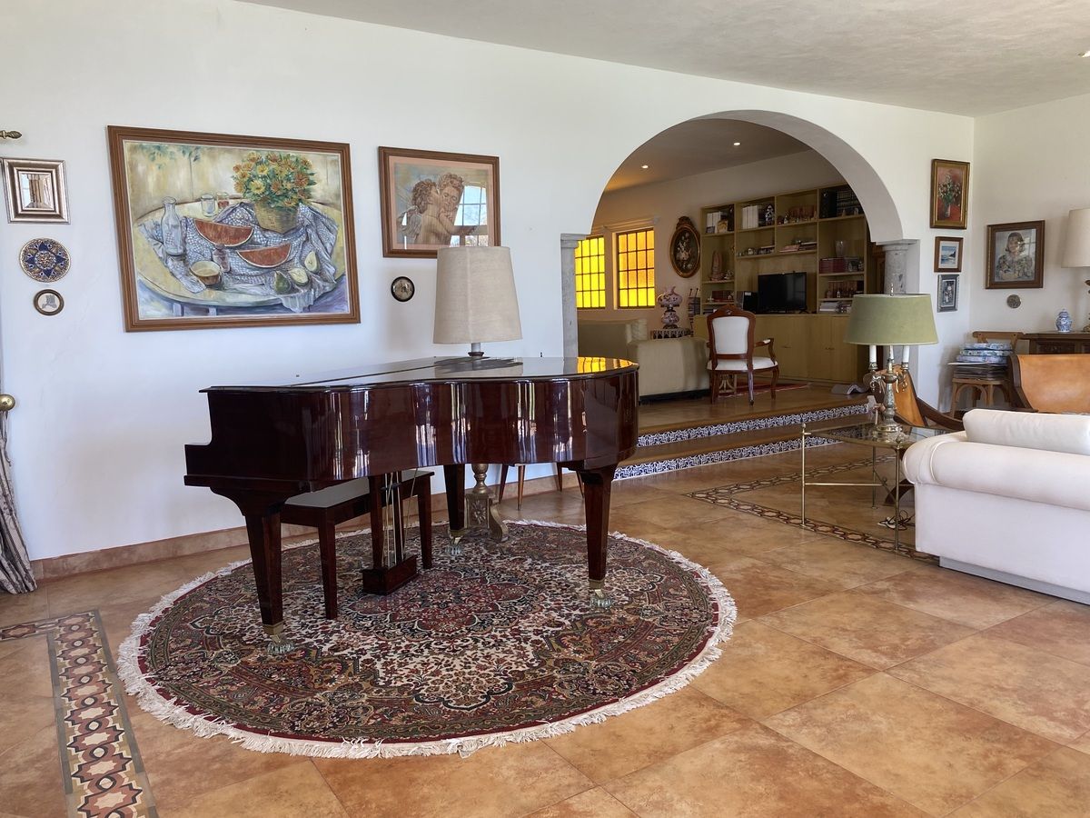 5 de 33: Sala/piano