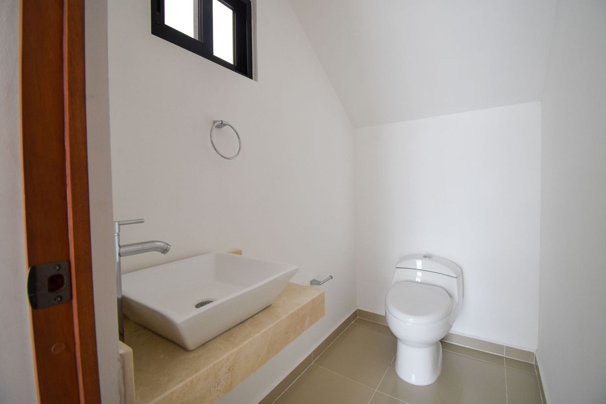 5 de 26: Medio Baño