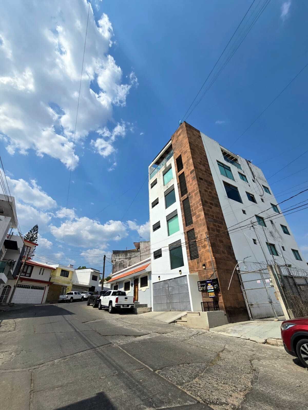 24 de 26: FACHADA DEL EDIFICIO