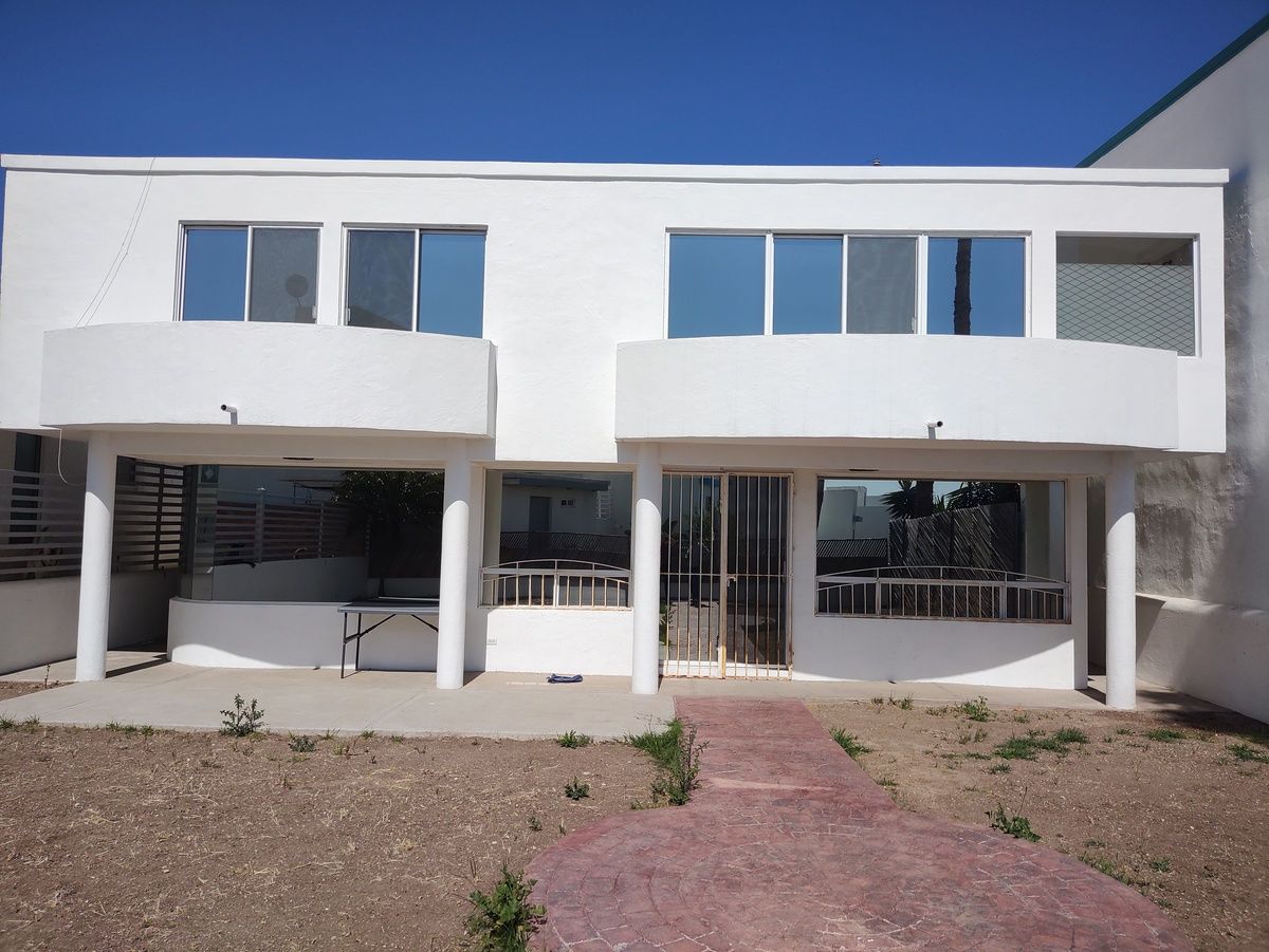 1 of 3: Back view to house