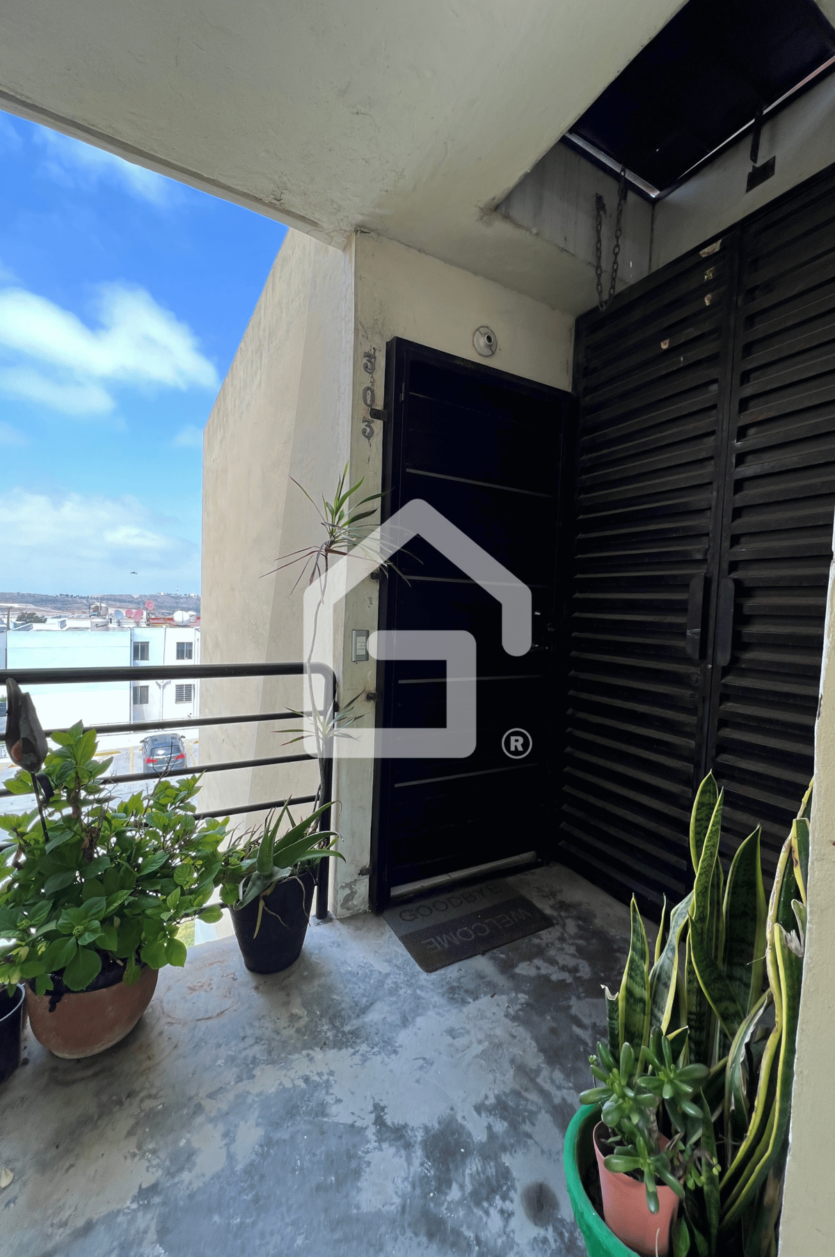 3 de 12: Entrada del departamento