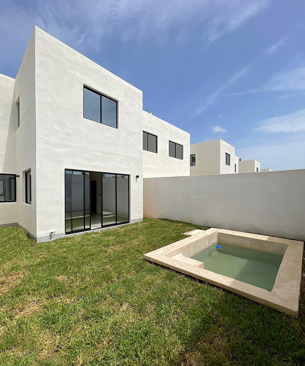 1 of 7: Fachada Posterior