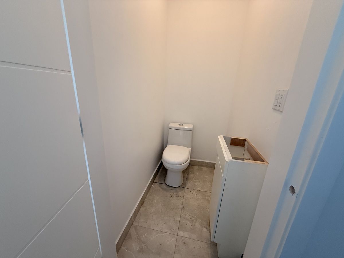 Medio baño en planta baja