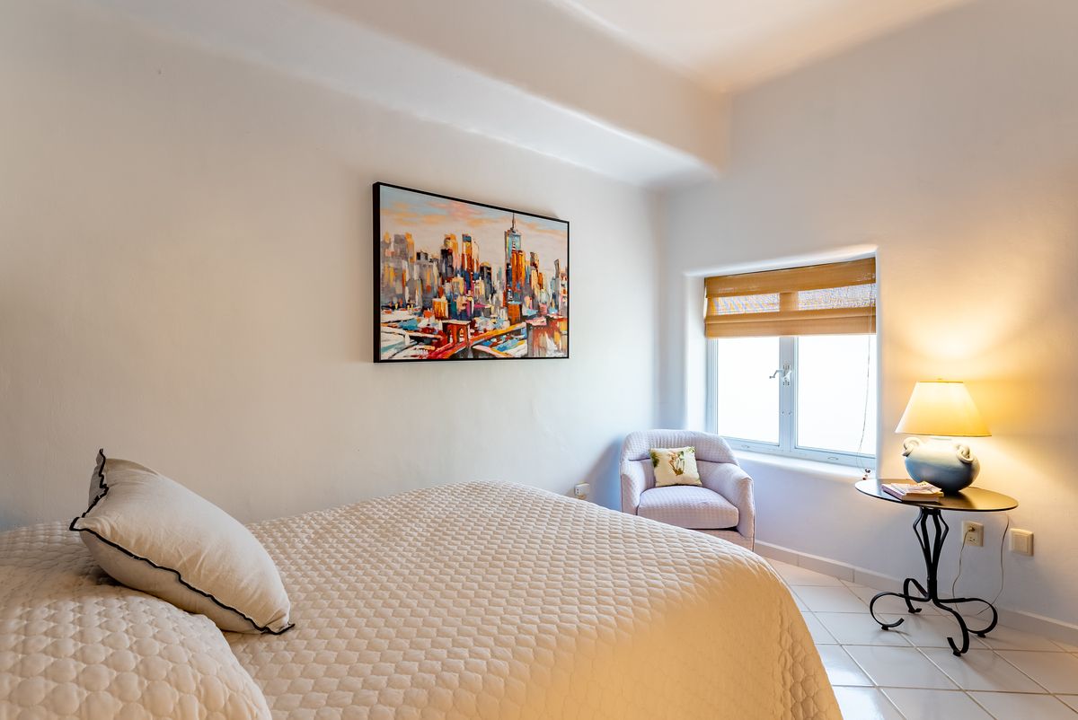15 of 22: Queen size bedroom guest
