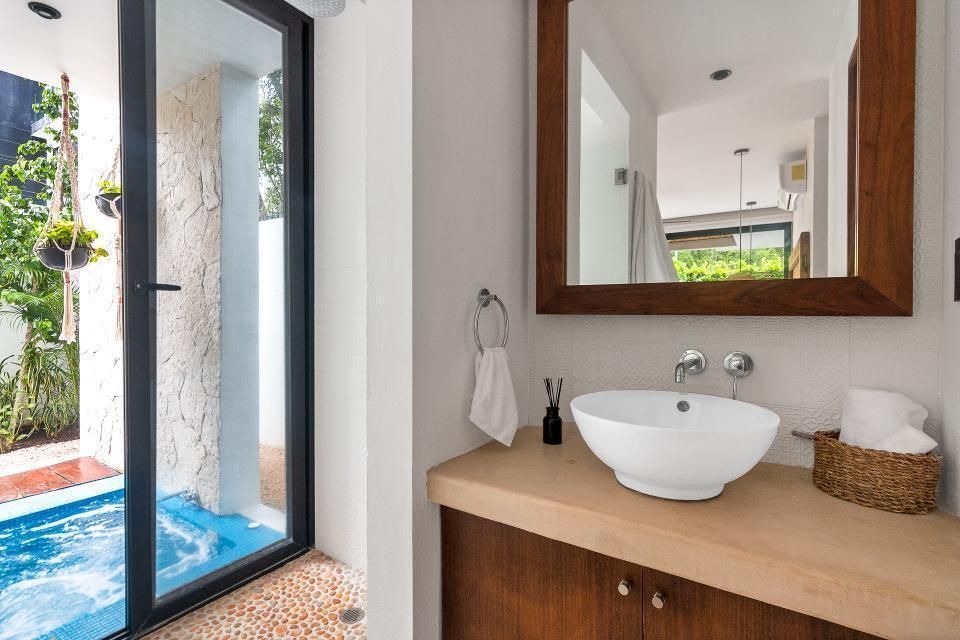 5 de 15: Baño con jacuzzi privado