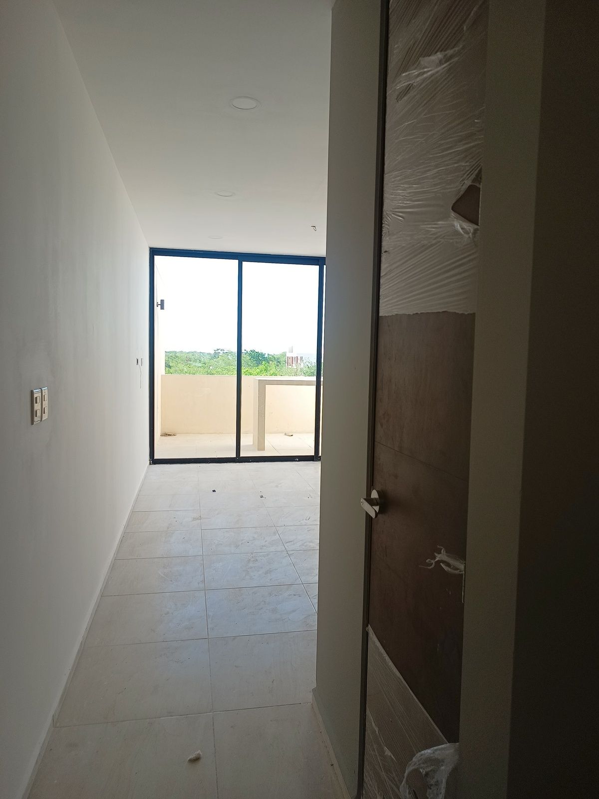 2 de 14: Entrada al departamento