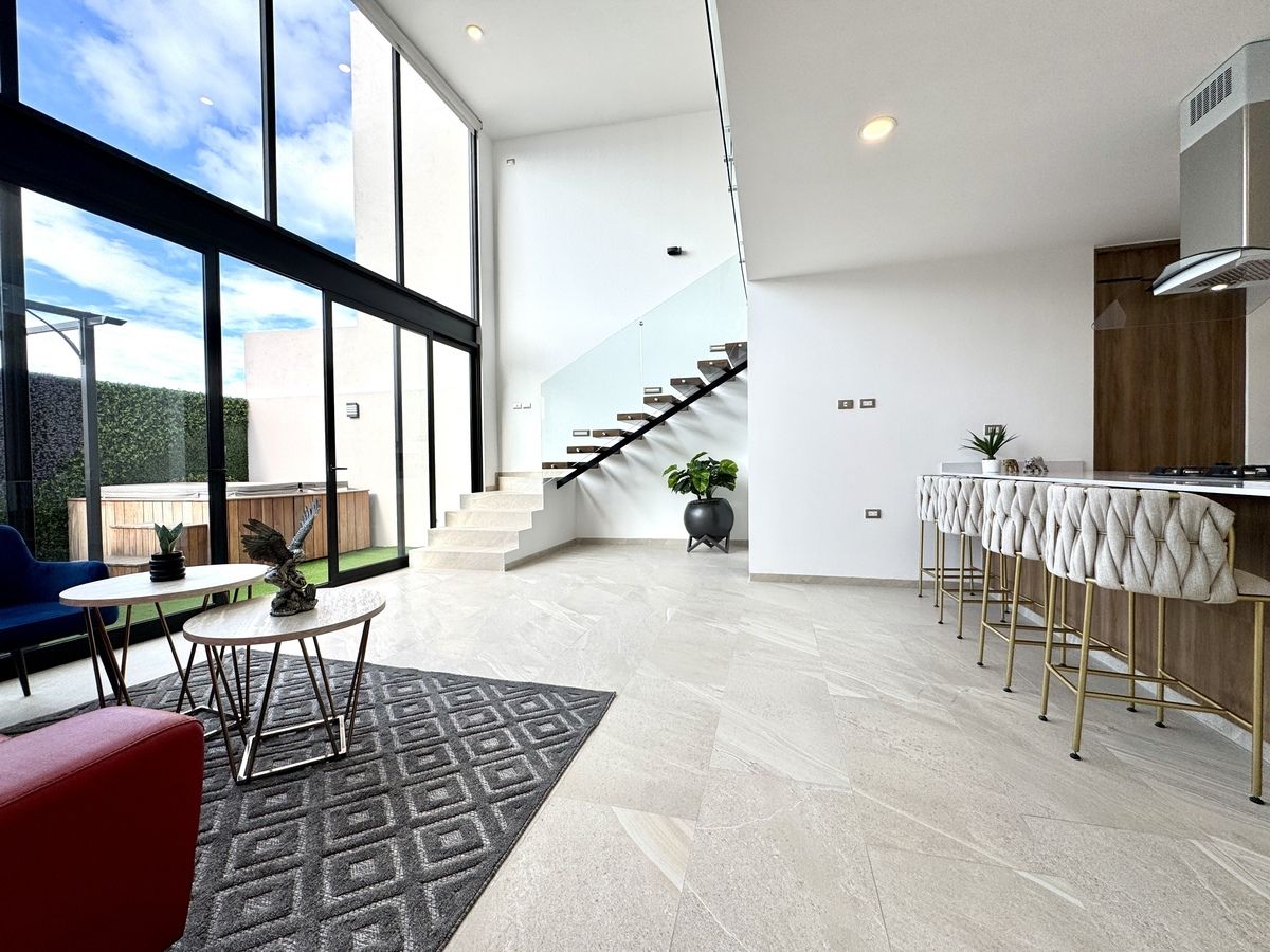 4 of 25: Sala lounge y cocina