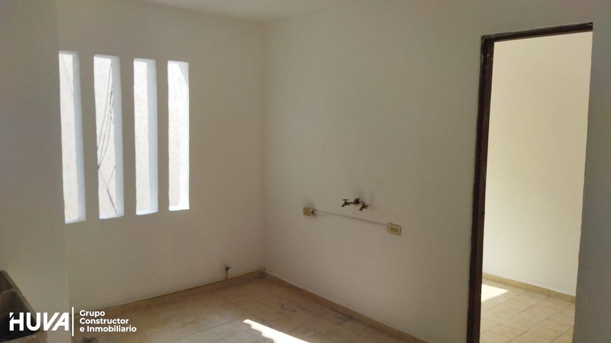 9 de 19: Vista del área de lavandería y acceso a cuarto de servicio.