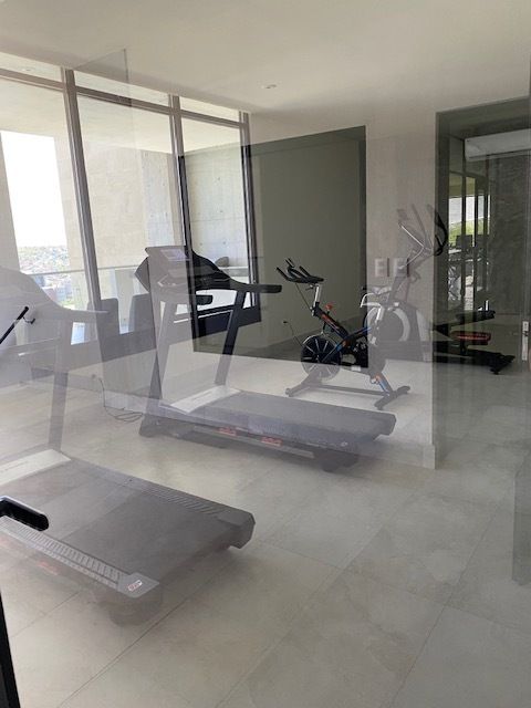 13 de 13: gimnasio área común
