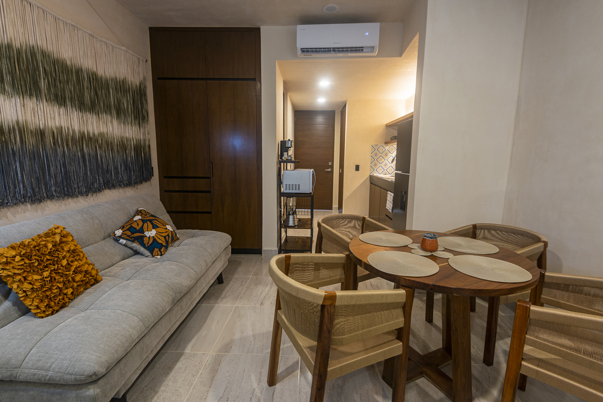17 de 27: Planta Baja - Vista Sofa Cama y Comedor