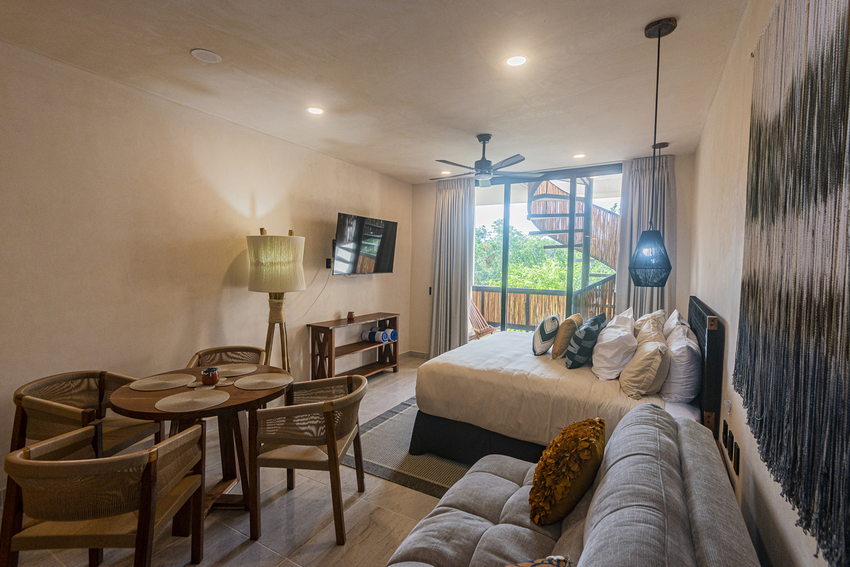 20 de 27: Planta Baja - Vista Sofa Cama y Comedor