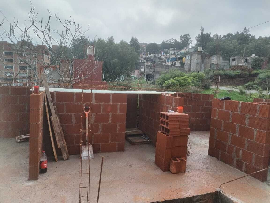 5 of 15: Casa en obra
